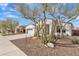 Charming single-story home featuring a stucco exterior, three-car garage and desert landscaping at 9626 W Bajada Rd, Peoria, AZ 85383