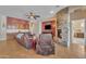 Inviting living room featuring a stone fireplace at 9626 W Bajada Rd, Peoria, AZ 85383