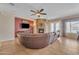Bright living room featuring a stone fireplace at 9626 W Bajada Rd, Peoria, AZ 85383
