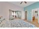 Comfortable main bedroom featuring a ceiling fan, closet with mirrored sliding doors, and ensuite access at 9626 W Bajada Rd, Peoria, AZ 85383