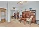 Cozy office with a built-in bookcase, a ceiling fan, and a mirrored closet at 9626 W Bajada Rd, Peoria, AZ 85383