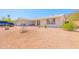 Charming single-story home with desert landscaping and a welcoming front porch at 11816 S Winnebago St, Phoenix, AZ 85044