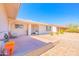 Inviting front porch with seating area, tiled flooring, and direct access to the entrance at 11816 S Winnebago St, Phoenix, AZ 85044