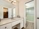 Bathroom featuring a large mirror over a vanity and an enclosed shower at 1257 W Dublin St, Chandler, AZ 85224