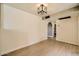 Inviting dining area with modern lighting and wood-look flooring at 1257 W Dublin St, Chandler, AZ 85224