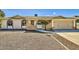 Charming single-story home with a well-maintained front yard and a two-car garage at 1257 W Dublin St, Chandler, AZ 85224