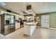Modern kitchen featuring white cabinets, stainless steel appliances, and an island at 1257 W Dublin St, Chandler, AZ 85224