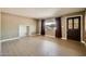 Spacious living room with wood-look floors and abundant natural light at 1257 W Dublin St, Chandler, AZ 85224