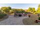 Relaxing backyard with a cozy outdoor fire pit and seating, perfect for entertaining guests at 13068 W Mine Trl, Peoria, AZ 85383