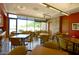 Bright and airy dining room with large windows and comfortable seating at 13068 W Mine Trl, Peoria, AZ 85383