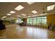 Spacious fitness center with rows of exercise bikes and large windows overlooking the grounds at 13068 W Mine Trl, Peoria, AZ 85383