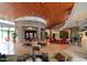 Spacious lobby with stone pillars, comfortable seating and plenty of natural light at 13068 W Mine Trl, Peoria, AZ 85383