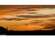 Beautiful sunset vista behind the majestic silhouette of the mountains at 13068 W Mine Trl, Peoria, AZ 85383