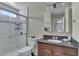 This bathroom features a glass enclosed walk in shower and granite countertops at 14145 N 92Nd St # 2046, Scottsdale, AZ 85260