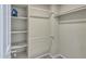 The large walk in closet features built in shelving at 14145 N 92Nd St # 2046, Scottsdale, AZ 85260
