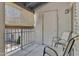 The inviting patio includes 2 chairs and outdoor lighting at 14145 N 92Nd St # 2046, Scottsdale, AZ 85260