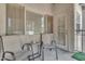 The bright patio includes 2 chairs and a table at 14145 N 92Nd St # 2046, Scottsdale, AZ 85260