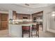 This kitchen features granite countertops, stainless steel appliances, and wooden cabinets at 15802 N 71St St # 311, Scottsdale, AZ 85254
