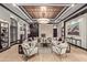 Sophisticated living room with decorative ceilings, a fireplace, and stylish seating at 15802 N 71St St # 311, Scottsdale, AZ 85254