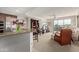 Spacious living room featuring granite countertops, stainless steel appliances, and an open-concept floor plan at 15802 N 71St St # 311, Scottsdale, AZ 85254