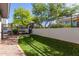 Green outdoor space with seating area and fenced-in area at 15802 N 71St St # 311, Scottsdale, AZ 85254