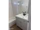 Bathroom featuring gray vanity, quartz countertops, and subway tile in shower/tub at 1620 E Jacinto Ave, Mesa, AZ 85204
