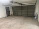 Clean, spacious garage with an automatic door, providing ample parking and storage at 1620 E Jacinto Ave, Mesa, AZ 85204