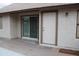 Private outdoor patio space with sliding glass door access to the home's interior at 1620 E Jacinto Ave, Mesa, AZ 85204