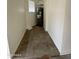 Compact utility area featuring a water heater and storage space at 1620 E Jacinto Ave, Mesa, AZ 85204