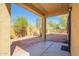Covered back patio with brick flooring and a view of the yard at 16238 N 22Nd Ln, Phoenix, AZ 85023