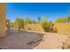 Backyard with brick patio, block wall, and plants at 16238 N 22Nd Ln, Phoenix, AZ 85023