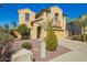 Attractive home exterior featuring desert landscaping, a tile roof, and an inviting entrance at 16238 N 22Nd Ln, Phoenix, AZ 85023