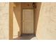 A close up of the front door, showing an ornate screen door and welcoming entryway at 16238 N 22Nd Ln, Phoenix, AZ 85023