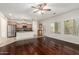 Modern kitchen with stainless steel appliances, granite countertops, and hardwood flooring at 16238 N 22Nd Ln, Phoenix, AZ 85023