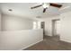 Upstairs loft area featuring carpet flooring, natural light, and an open layout at 16238 N 22Nd Ln, Phoenix, AZ 85023
