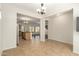 Inviting open-concept layout featuring tile floors and views of the kitchen and living areas at 16238 N 22Nd Ln, Phoenix, AZ 85023