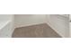 Walk-in closet with neutral carpet, white walls, and shelving system at 16238 N 22Nd Ln, Phoenix, AZ 85023