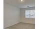 Neutral carpeted bedroom with window providing natural light at 17567 W Adams St, Goodyear, AZ 85338