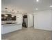 Open kitchen featuring a large island, stainless steel appliances, and pendant lighting at 17567 W Adams St, Goodyear, AZ 85338