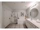 Bright bathroom featuring a soaking tub, walk-in shower, and double sinks at 19700 N 76Th St # 1124, Scottsdale, AZ 85255