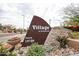 Landscaped sign reading 