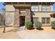 A well-maintained exterior with desert landscaping, stone accents and tiled roof at 19700 N 76Th St # 1124, Scottsdale, AZ 85255