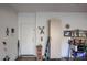 Garage interior with access door and shelving for organized storage at 19700 N 76Th St # 1124, Scottsdale, AZ 85255