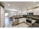 Open-concept kitchen with stainless steel appliances and a view to the dining area at 19700 N 76Th St # 1124, Scottsdale, AZ 85255