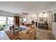 The living room features neutral colors, tile floors and a seamless flow to the dining area at 19700 N 76Th St # 1124, Scottsdale, AZ 85255