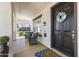 Cozy front porch with comfortable seating, stylish decorations, and a welcoming entrance at 20897 W Edith Way, Buckeye, AZ 85396