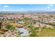 Aerial view of a community park featuring a pool, playground, and walking paths, surrounded by single-Gathering homes at 22318 S 226Th Pl, Queen Creek, AZ 85142