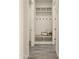 Inviting entryway showcasing a built-in storage unit with hooks and seating, perfect for organizing essentials at 22318 S 226Th Pl, Queen Creek, AZ 85142