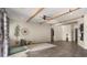 Expansive living room with beamed ceilings, decorative accents, and a neutral color palette, creating a warm and inviting space at 22318 S 226Th Pl, Queen Creek, AZ 85142