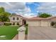 Charming two-story home featuring a three car garage and meticulously landscaped front yard at 2321 N Glenview --, Mesa, AZ 85213